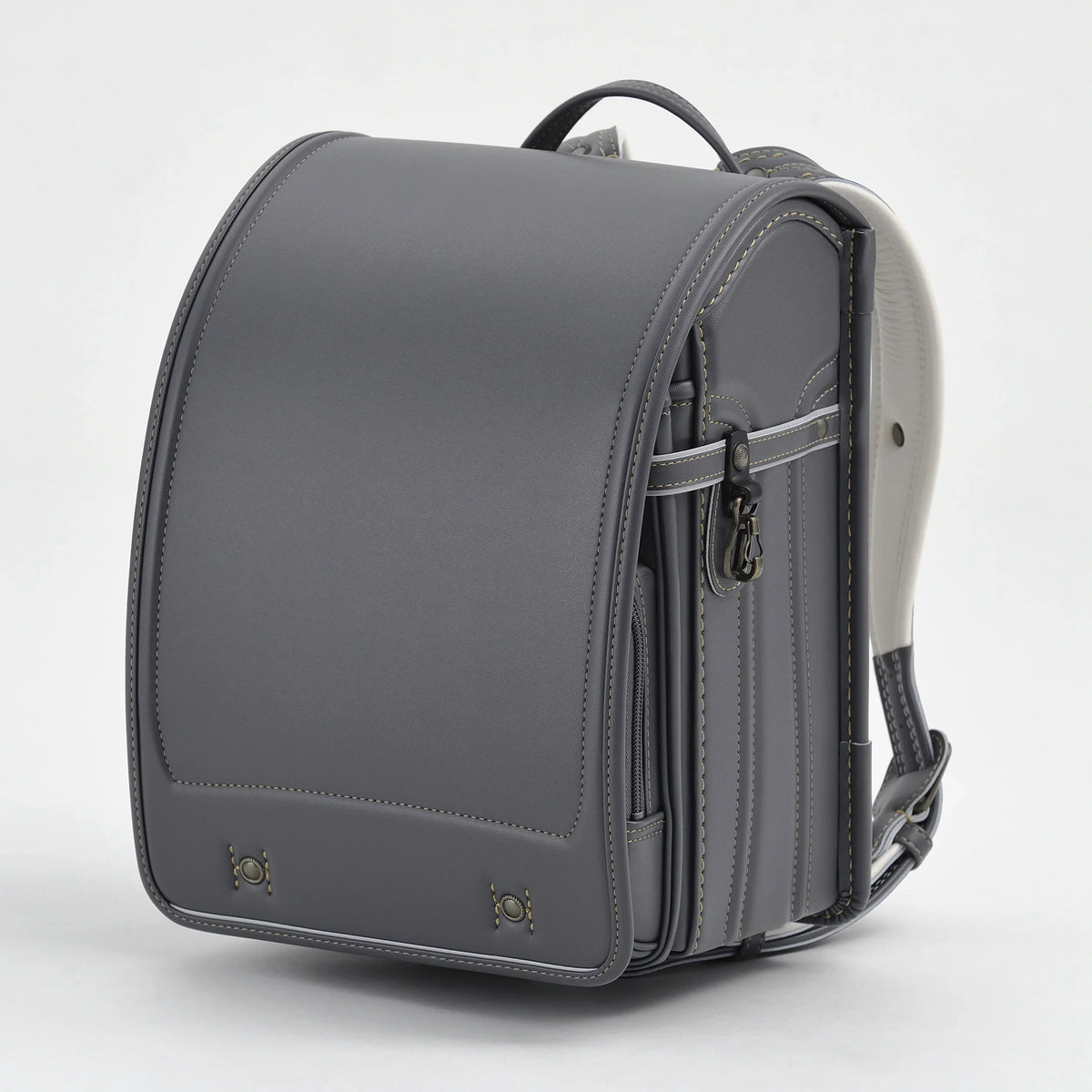 Bolca Randoseru by Murase Kabanko – gray Japanese randoseru backpack with structured design and white straps on white background