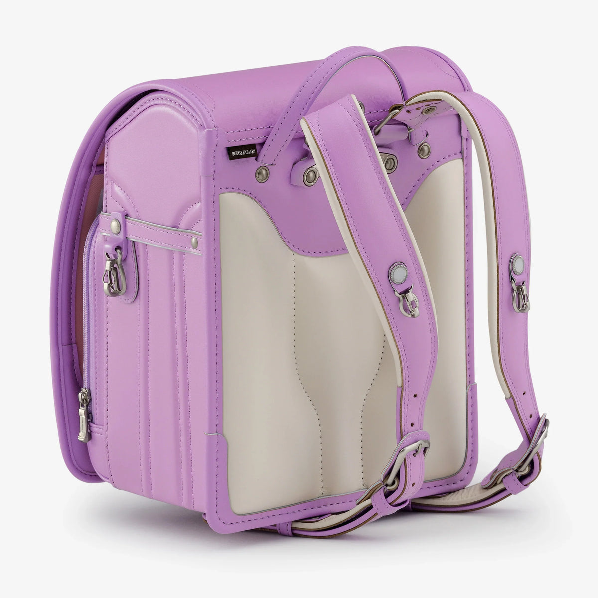 Bolca Randoseru – Leather by Murase Kabanko – lavender Japanese randoseru backpack with cream back panel, adjustable straps, side pocket.