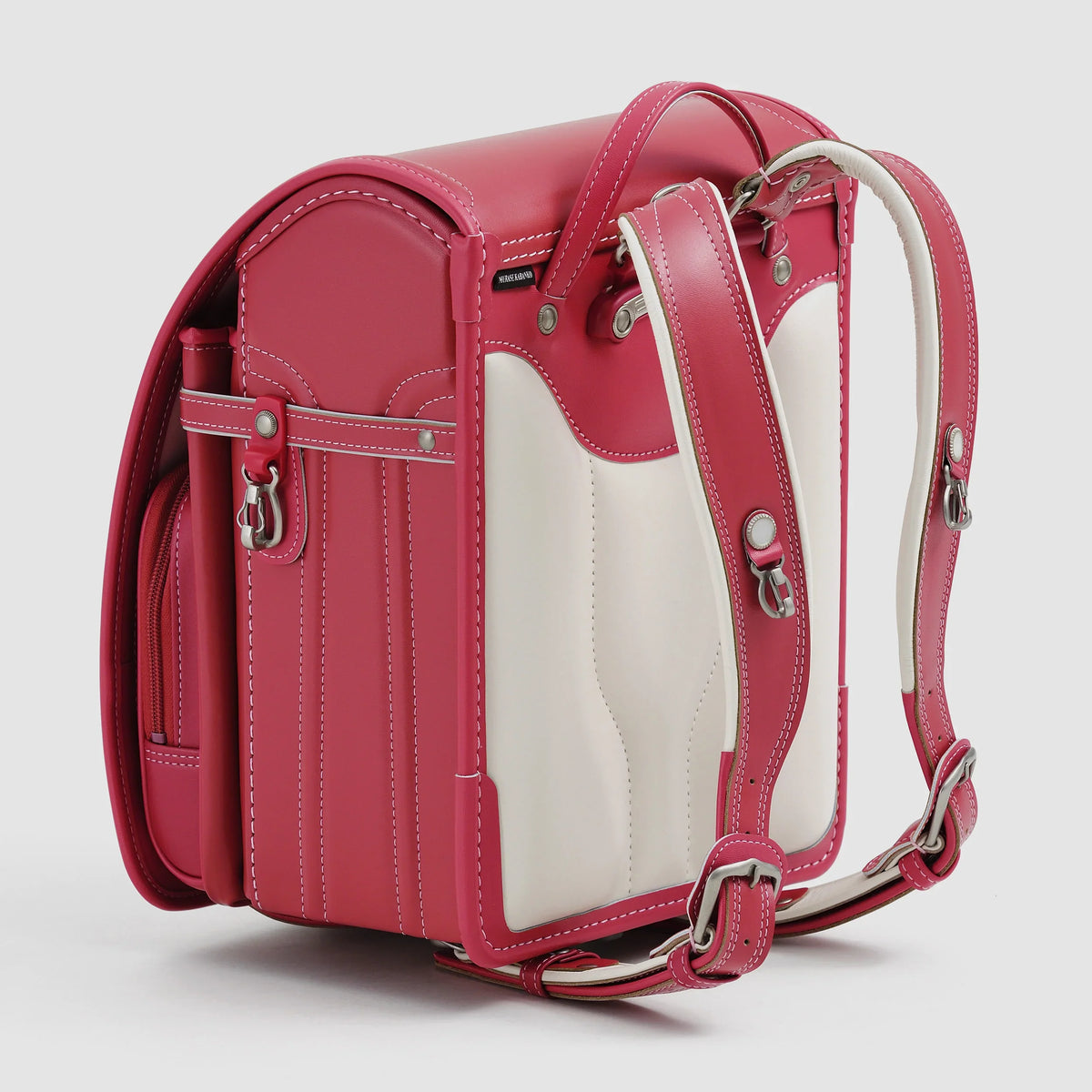 Bolca Randoseru by Murase Kabanko – japanese randoseru backpack in pink and white leather with ergonomic straps