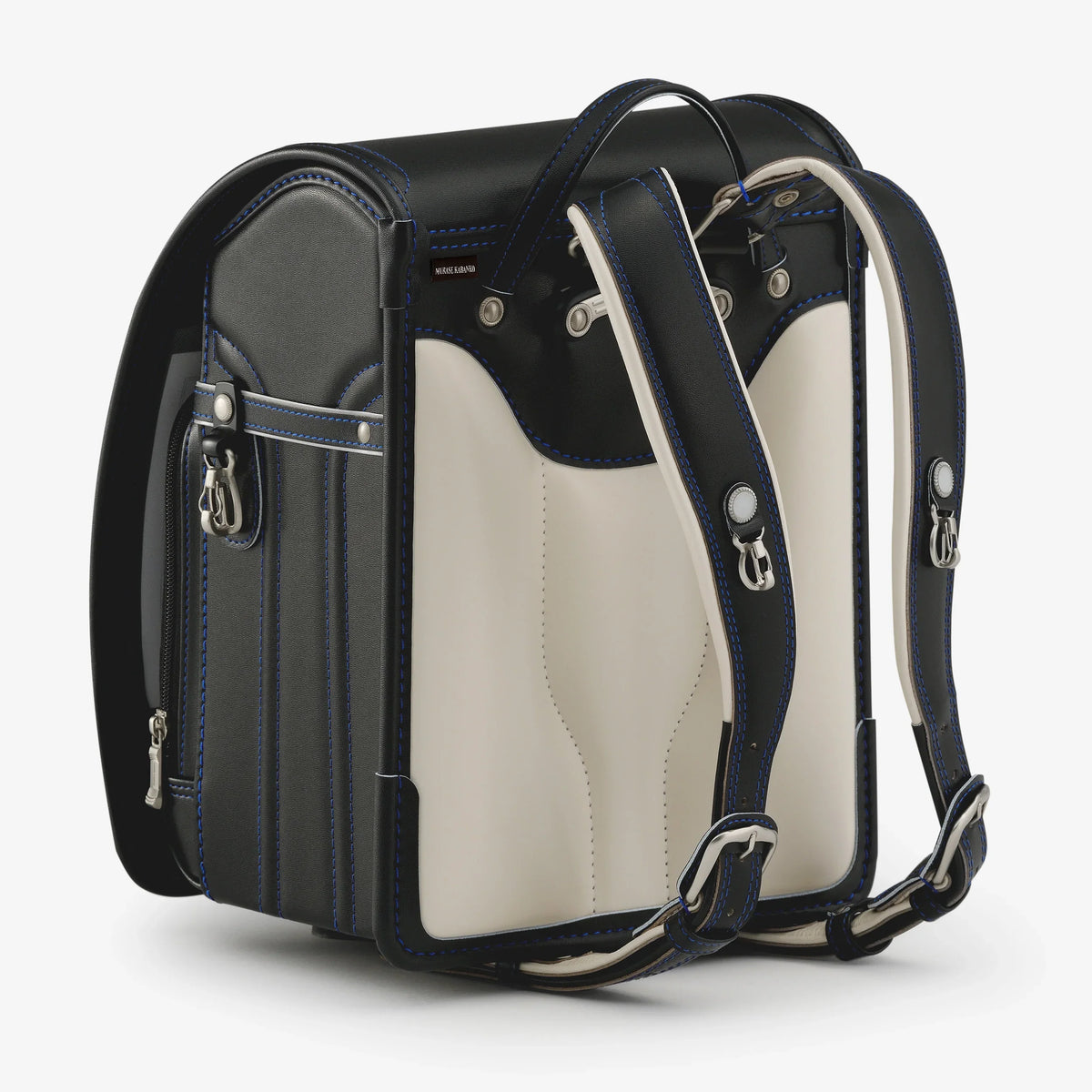 Bolca Randoseru – Leather by Murase Kabanko – japanese Randoseru backpack with black and white leather and blue stitching, rear view