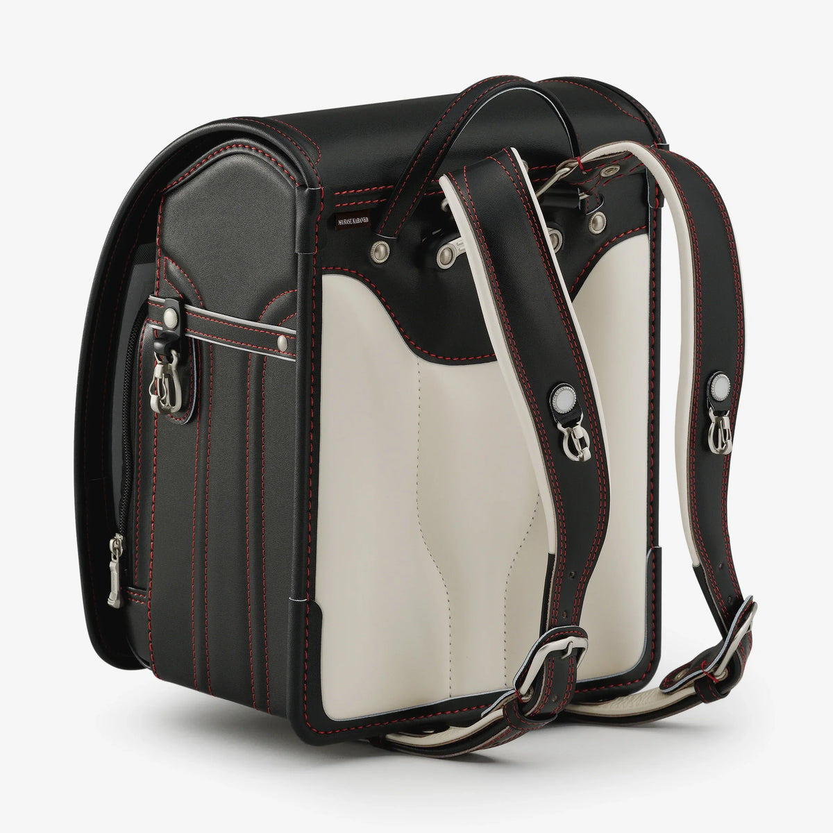 Bolca Randoseru – Leather by Murase Kabanko – black and white Japanese randoseru backpack with red stitching, adjustable shoulder straps