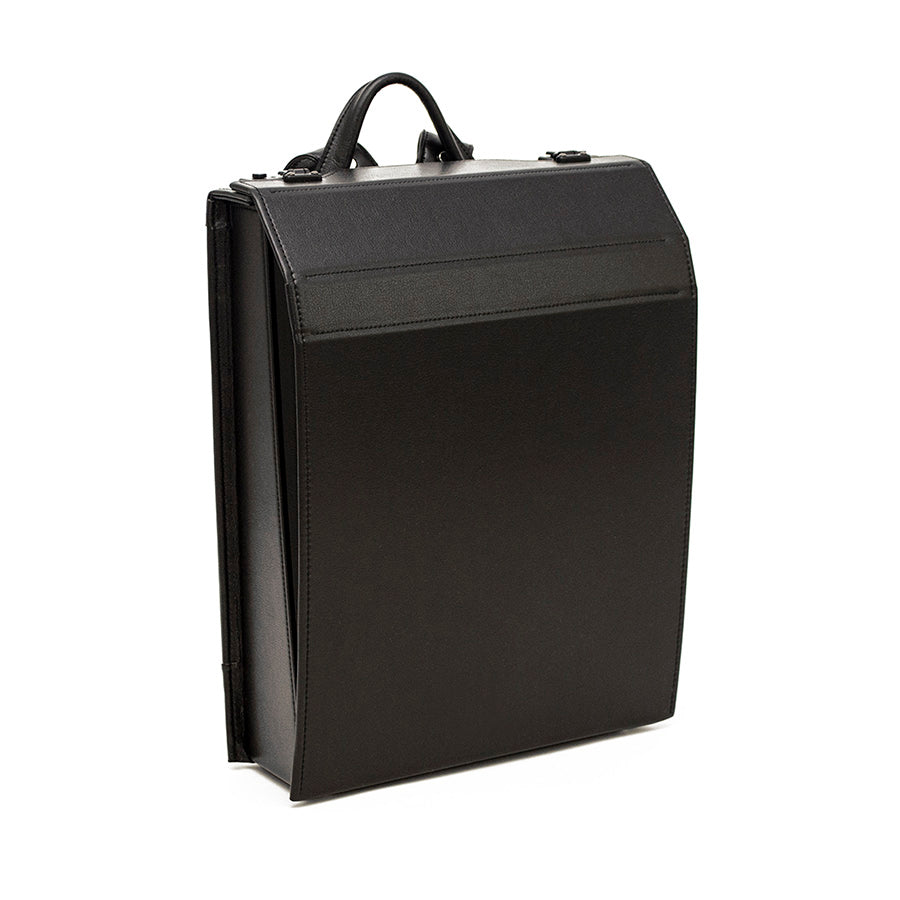 Black Japanese randoseru backpack with a sleek, minimalist rectangular design