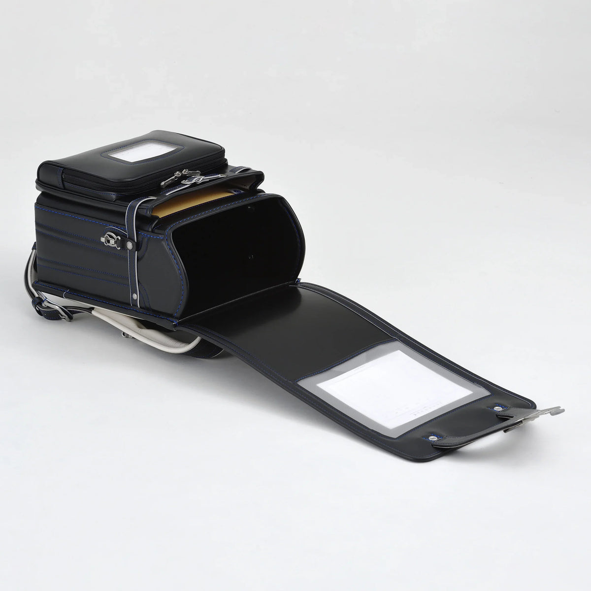 Bolca Randoseru by Murase Kabanko – black Japanese randoseru backpack with blue stitching, open to show spacious main compartment.