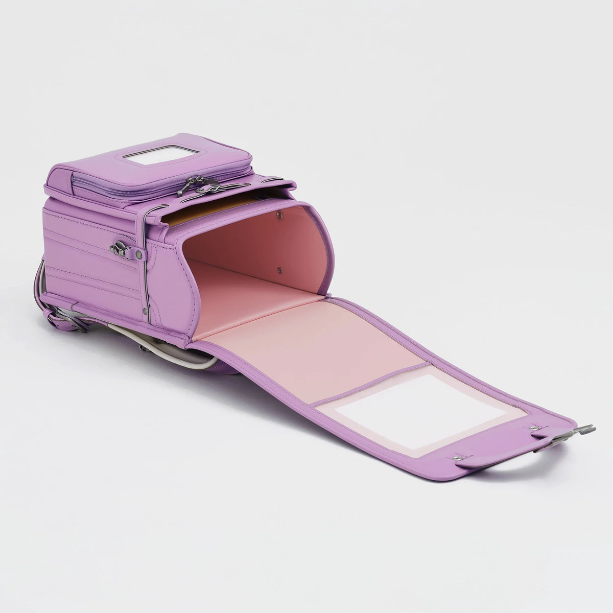 Bolca Randoseru by Murase Kabanko – open lavender Japanese randoseru backpack with pink interior on white background