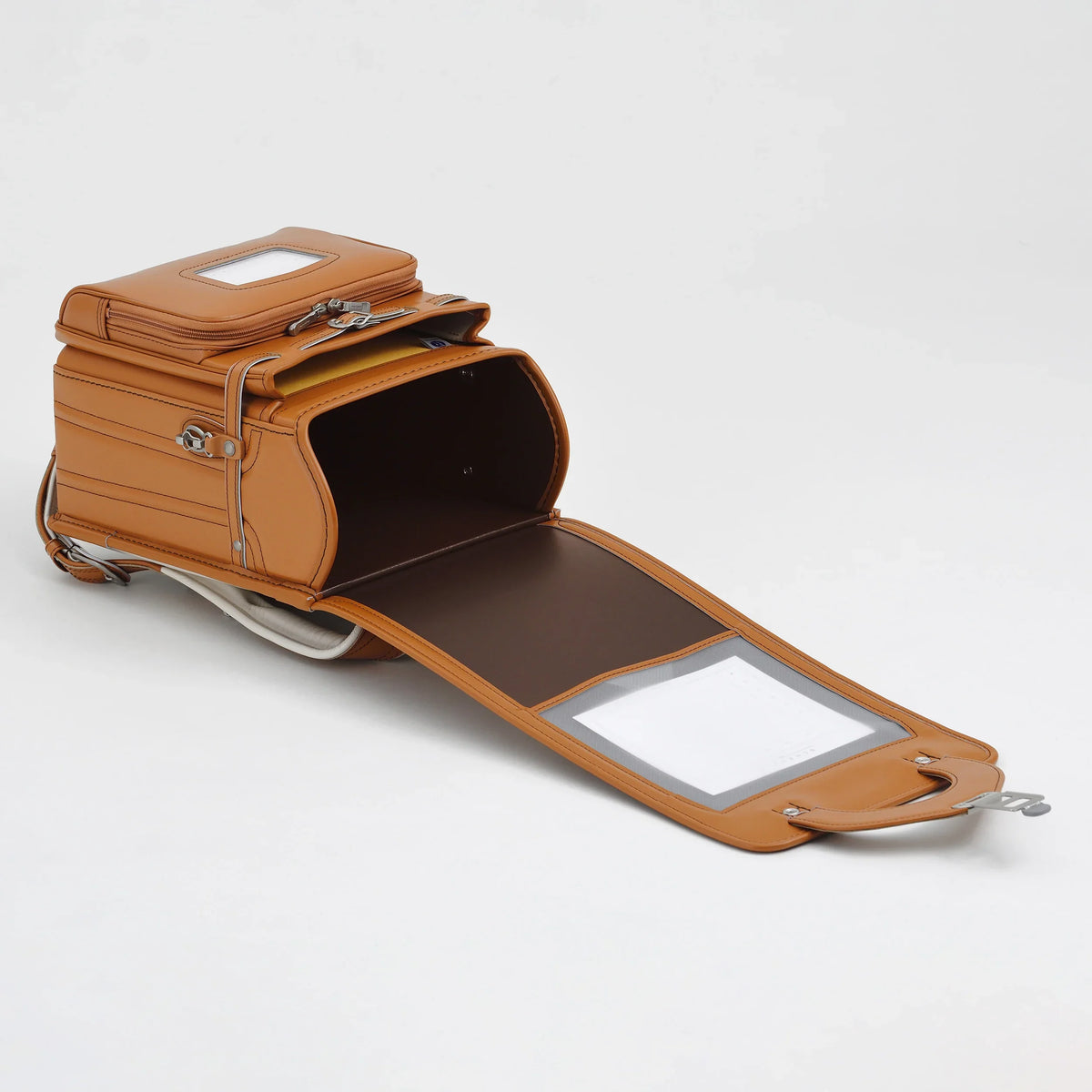 Bolca Randoseru by Murase Kabanko – open brown Japanese randoseru backpack with visible inner compartments on white background