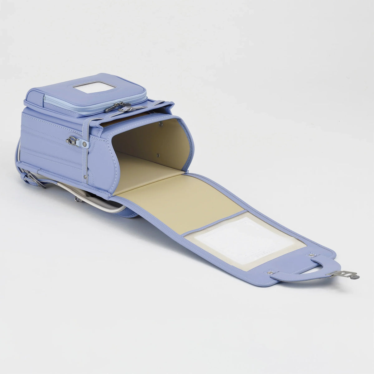 Bolca Randoseru by Murase Kabanko – light blue Japanese randoseru backpack open, showing spacious interior and flap, on white background