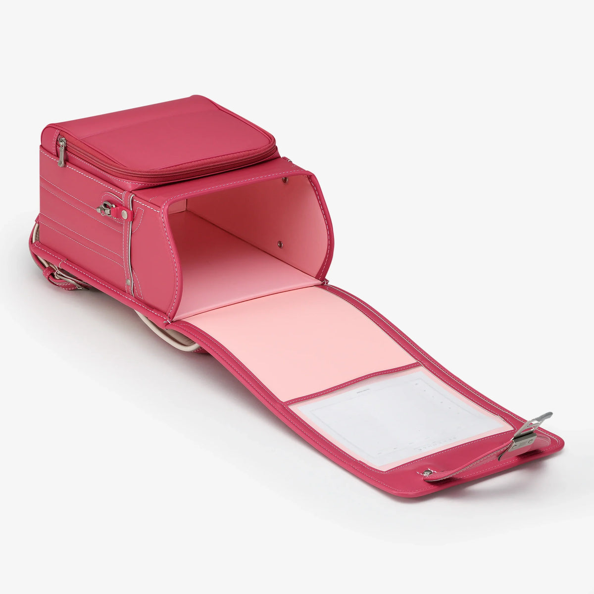 Bolca Randoseru – Leather by Murase Kabanko – open pink Japanese Randoseru backpack with visible inner compartments on white background.