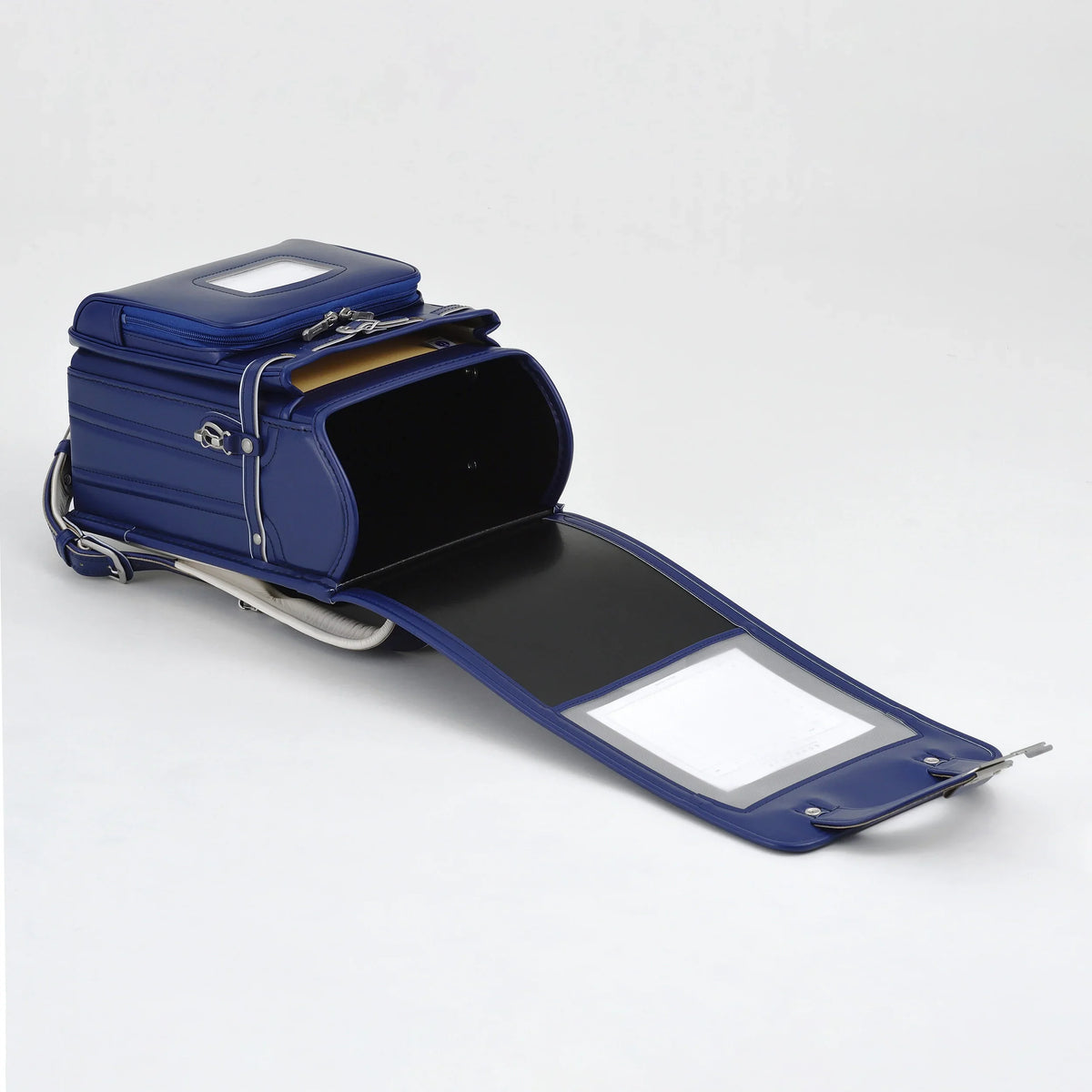 Bolca Randoseru by Murase Kabanko – open navy blue Japanese randoseru backpack with visible compartments on white background