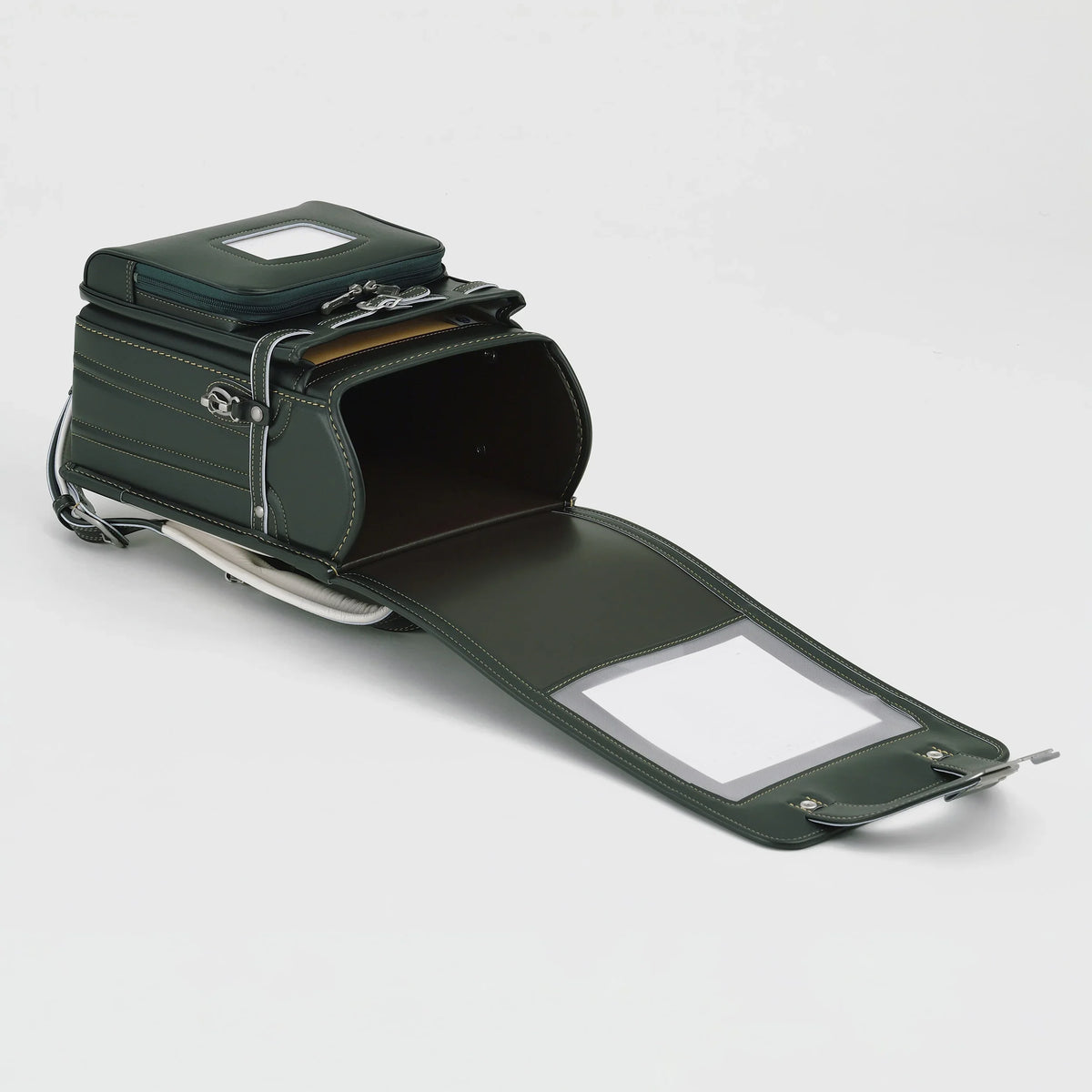 Bolca Randoseru by Murase Kabanko – dark green Japanese randoseru backpack open on white background