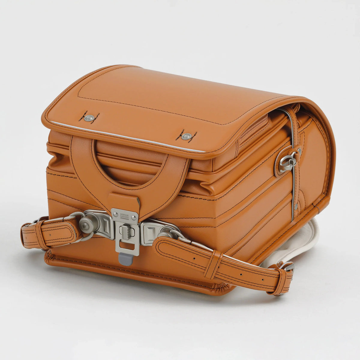 Bolca Randoseru by Murase Kabanko – brown Japanese randoseru backpack with metal clasp and leather straps on white background