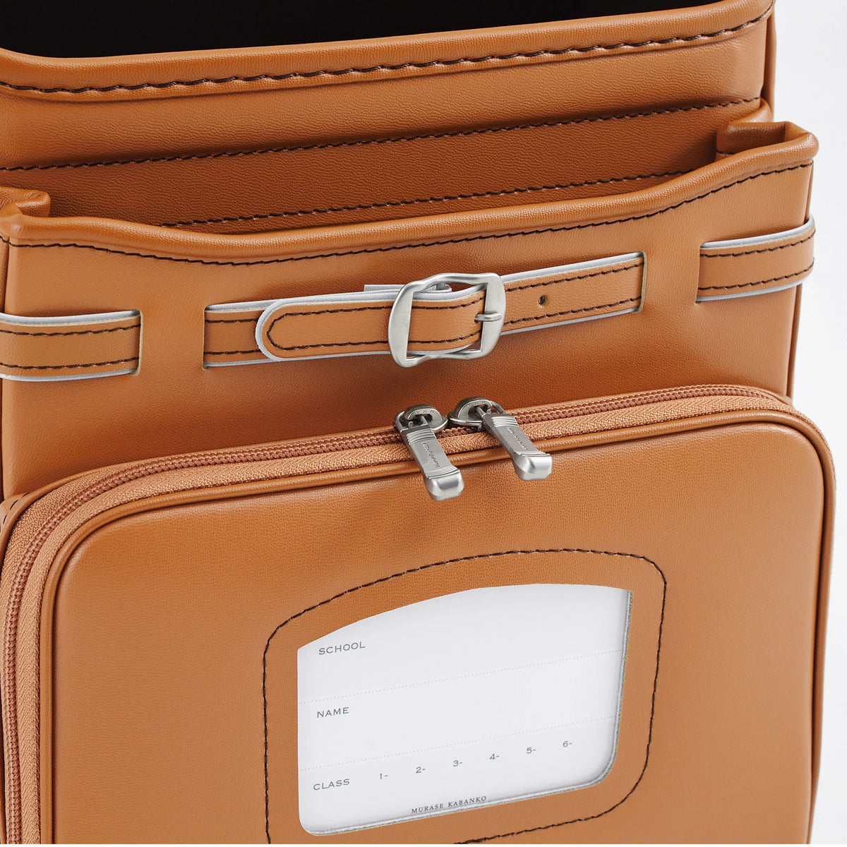 Bolca Randoseru by Murase Kabanko – close-up of tan Japanese randoseru backpack with silver buckles and name tag window