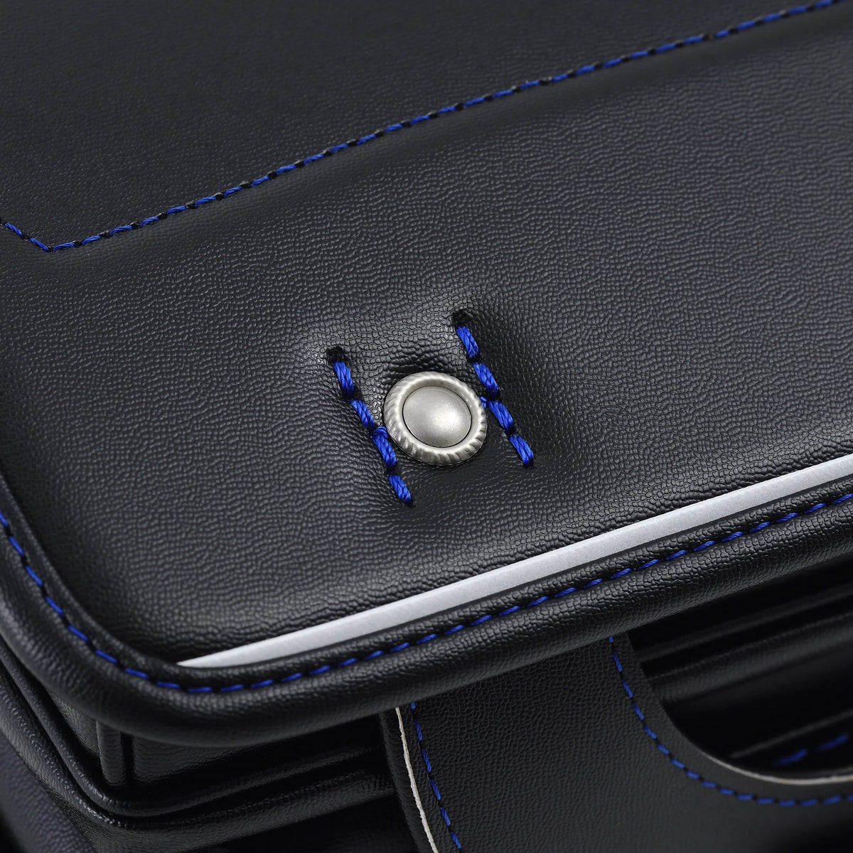 Bolca Randoseru by Murase Kabanko – close-up of black Japanese randoseru backpack with blue stitching and metal button detail