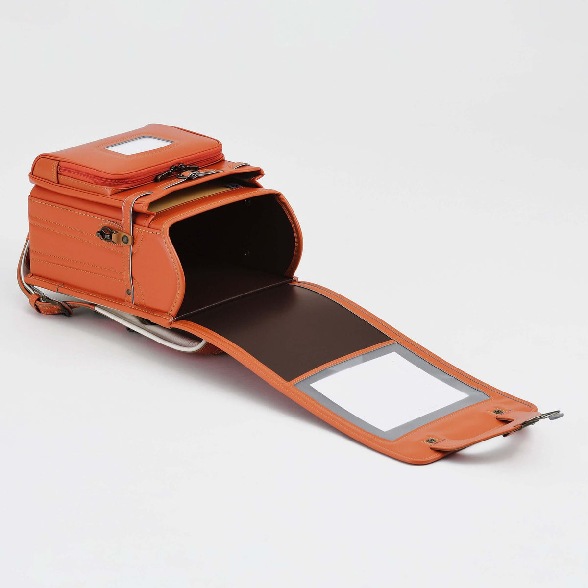 Bolca Randoseru by Murase Kabanko – open orange Japanese randoseru backpack with metal frame on white background