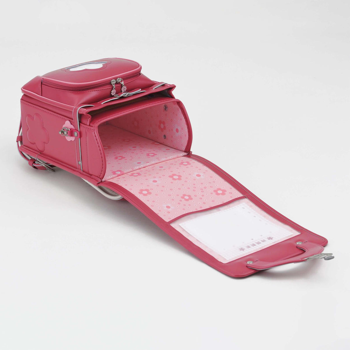 Huo Randoseru by Murase Kabanko – pink Japanese randoseru backpack with floral pattern interior and open flap, front view