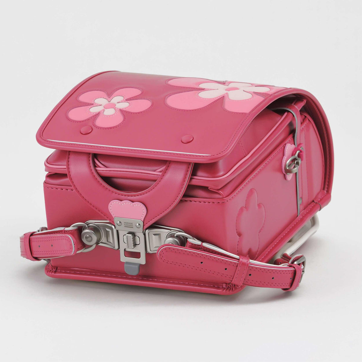 Huo Randoseru by Murase Kabanko – pink Japanese randoseru backpack with flower design and silver hardware on white background