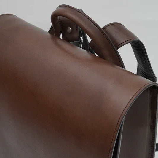 Close-up of brown Japanese Randoseru backpack with leather texture and sturdy handle