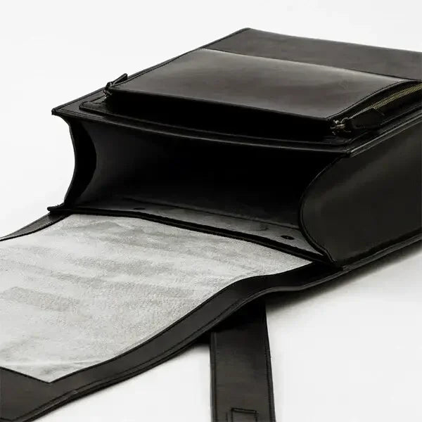 Adult Randoseru Backpack (Kabuto) in black Tochigi leather by 村瀬鞄行, opened to reveal spacious interior and front flap.
