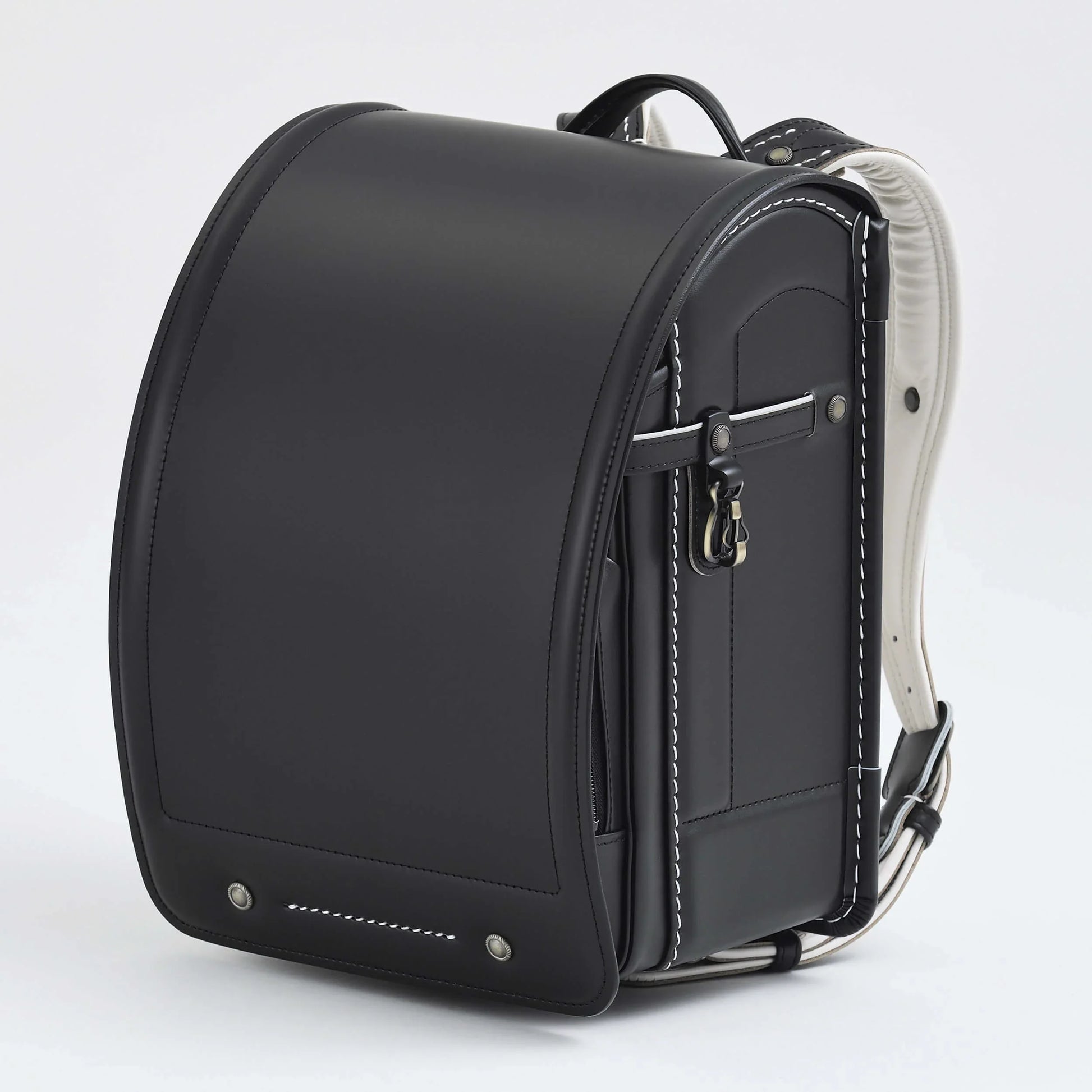 Randoseru Takumi black backpack by Murase Kabanko with white contrast stitching and padded straps