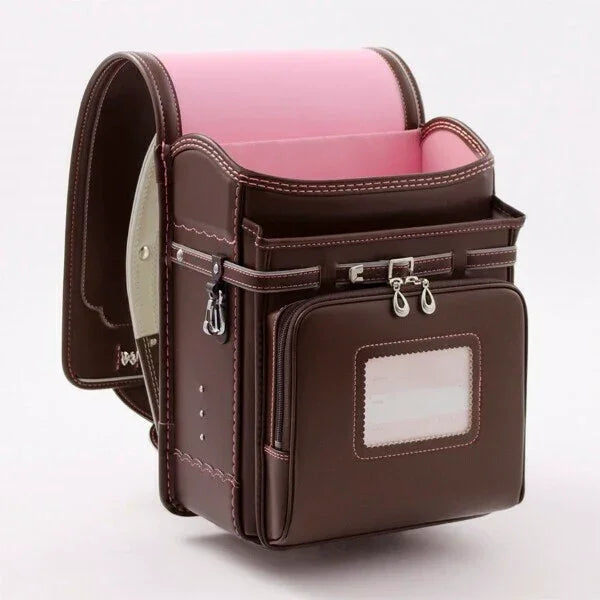 Brown and pink Japanese Randoseru backpack with front zipper pocket for kids