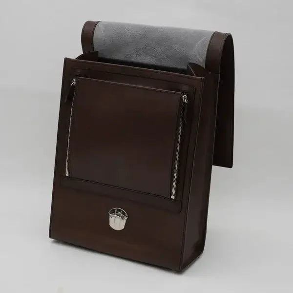 Dark brown Japanese randoseru school backpack with dual zippers and flap open