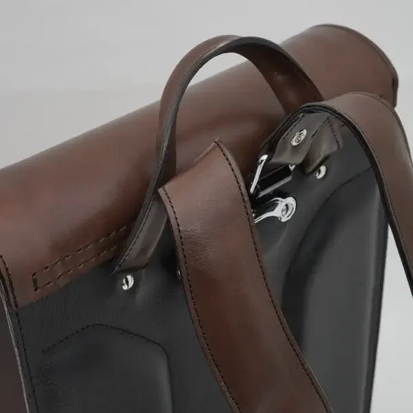 Close-up of brown leather Japanese randoseru schoolbag handle and straps