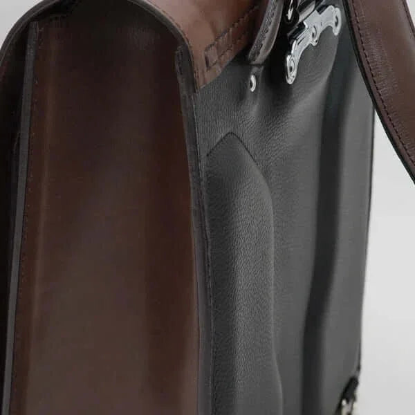 Close-up of Japanese randoseru black and brown leather school backpack