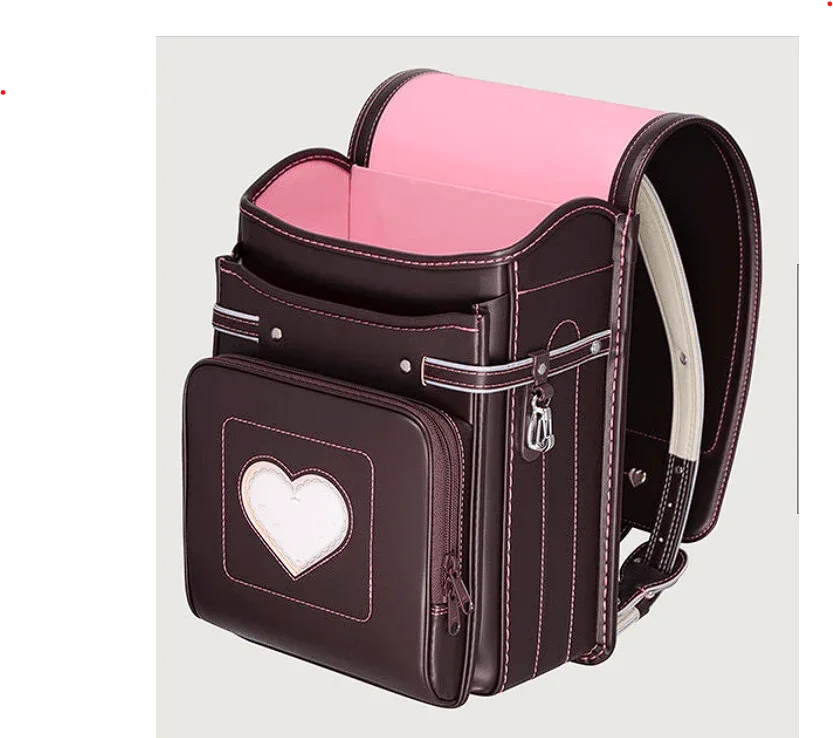 Randoseru backpack in chocolate brown with pink interior and heart-front pocket by Murase Kabanko