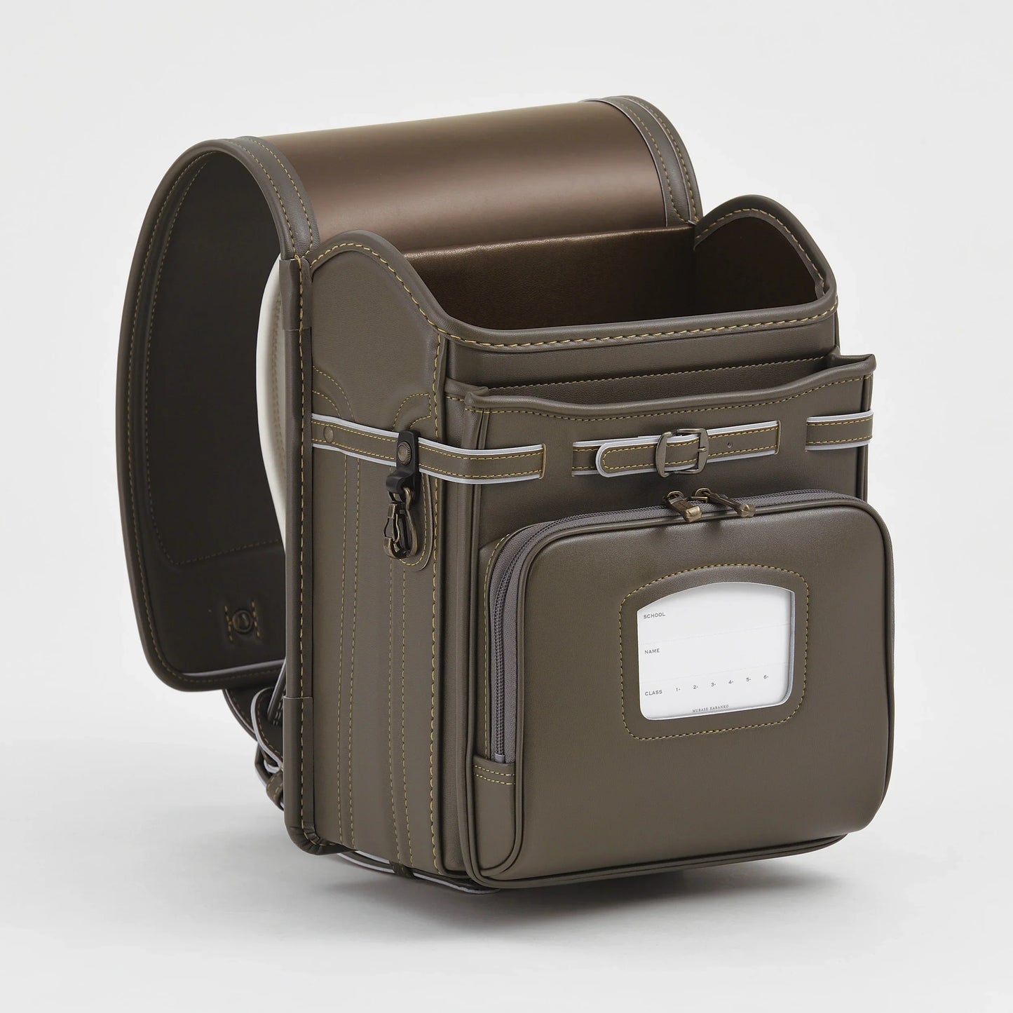 Olive green Japanese randoseru backpack with front pocket and sturdy stitching