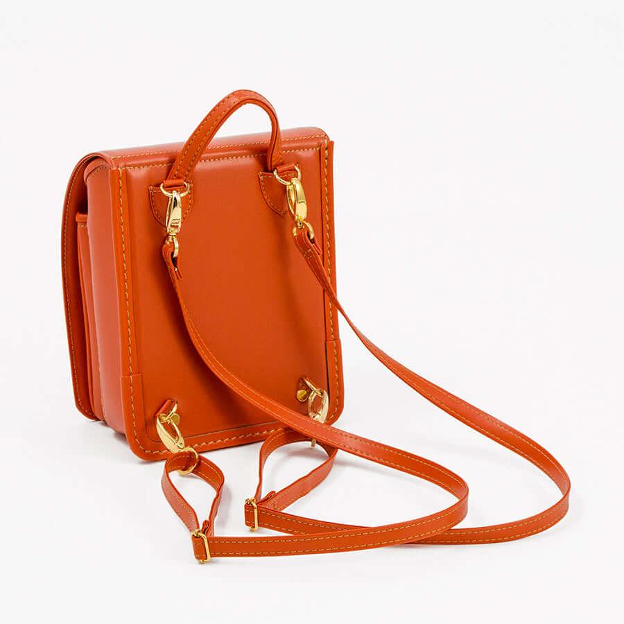 Murase Kabanko mini randoseru backpack in orange with gold hardware and detachable strap