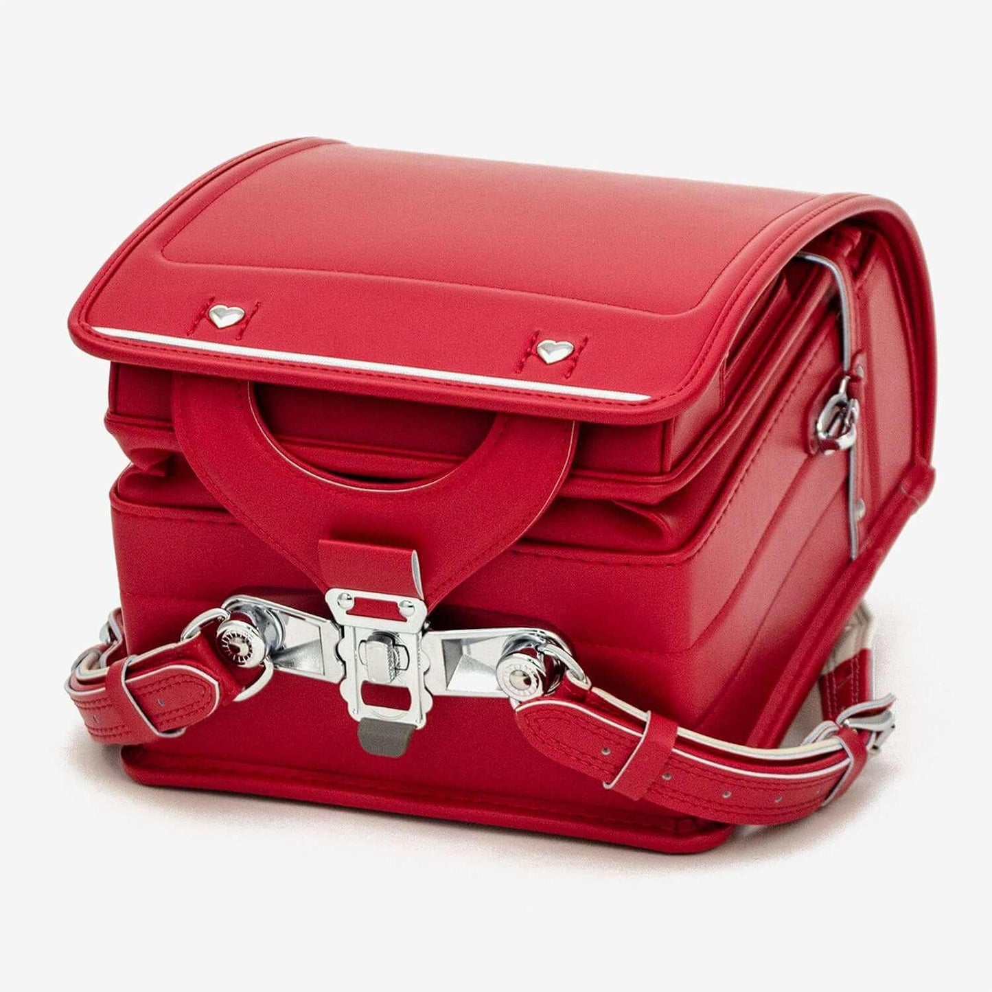 Randoseru red backpack by Murase Kabanko with heart-shaped accents and silver hardware