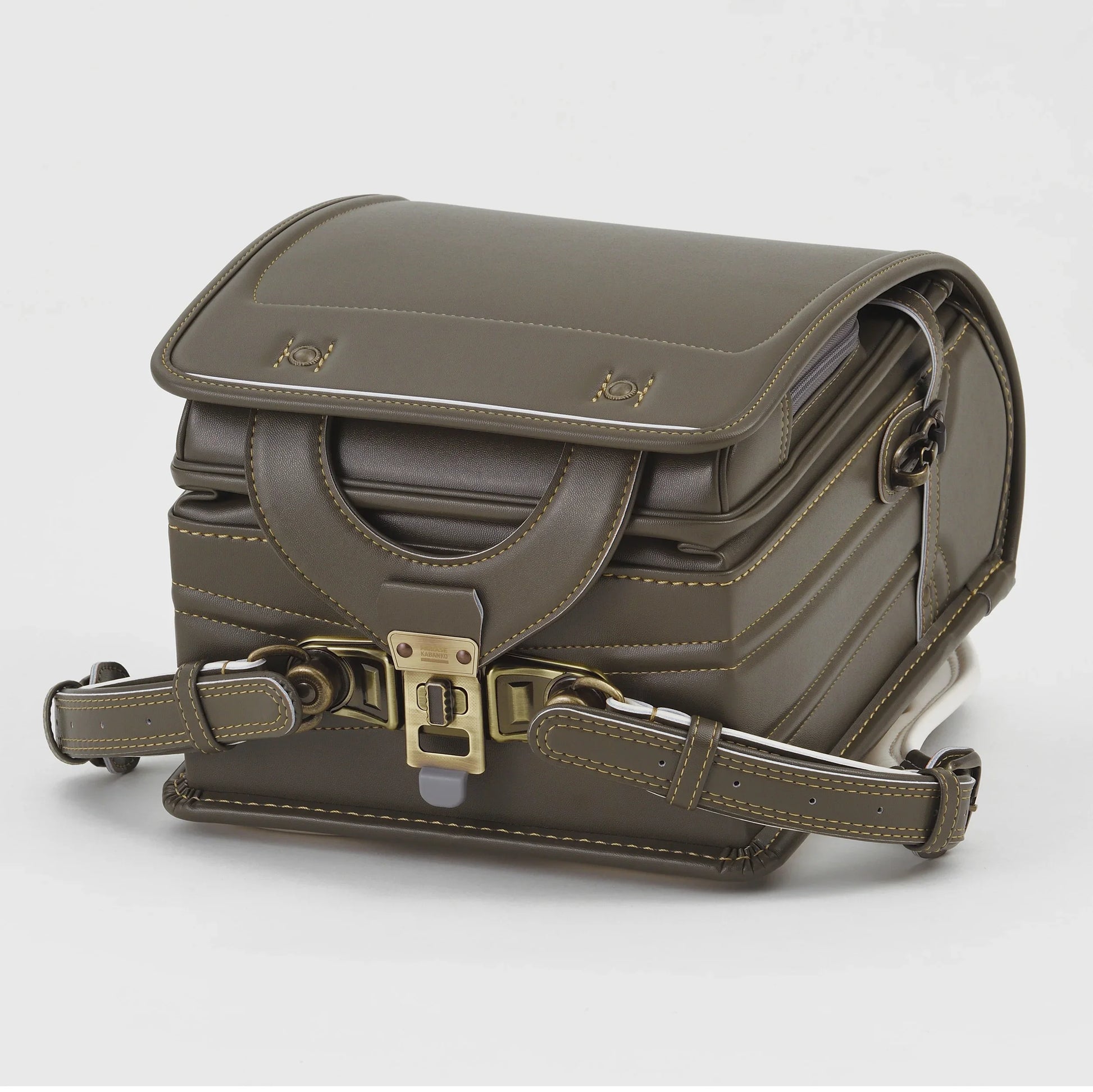 Authentic Japanese randoseru backpack in olive green leather with brass hardware