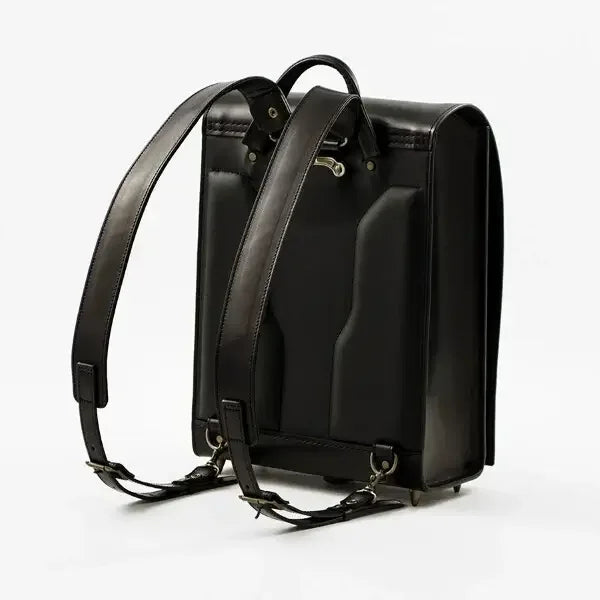 Adult Randoseru Backpack (Kabuto) in black Tochigi leather, Made in Japan, with padded back and adjustable straps.