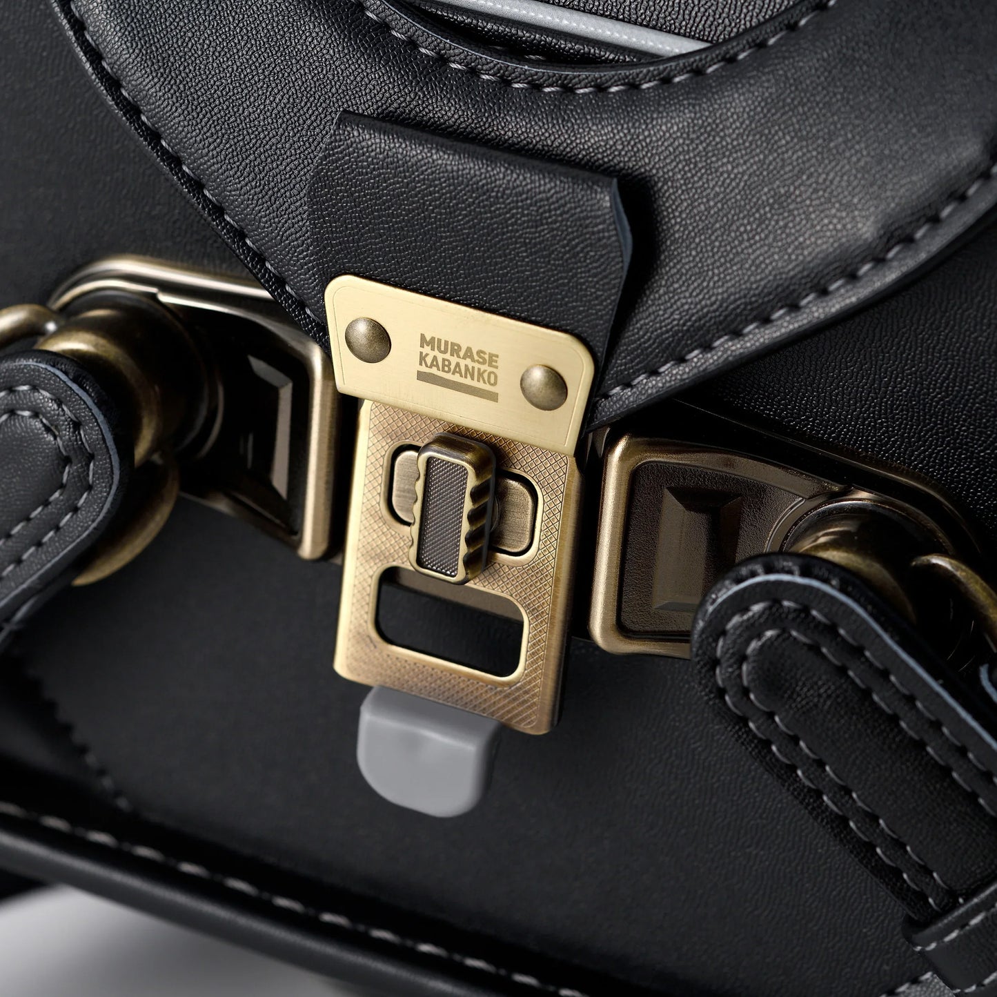 Close-up of Japanese randoseru backpack black leather with Murase Kabanko brass clasp