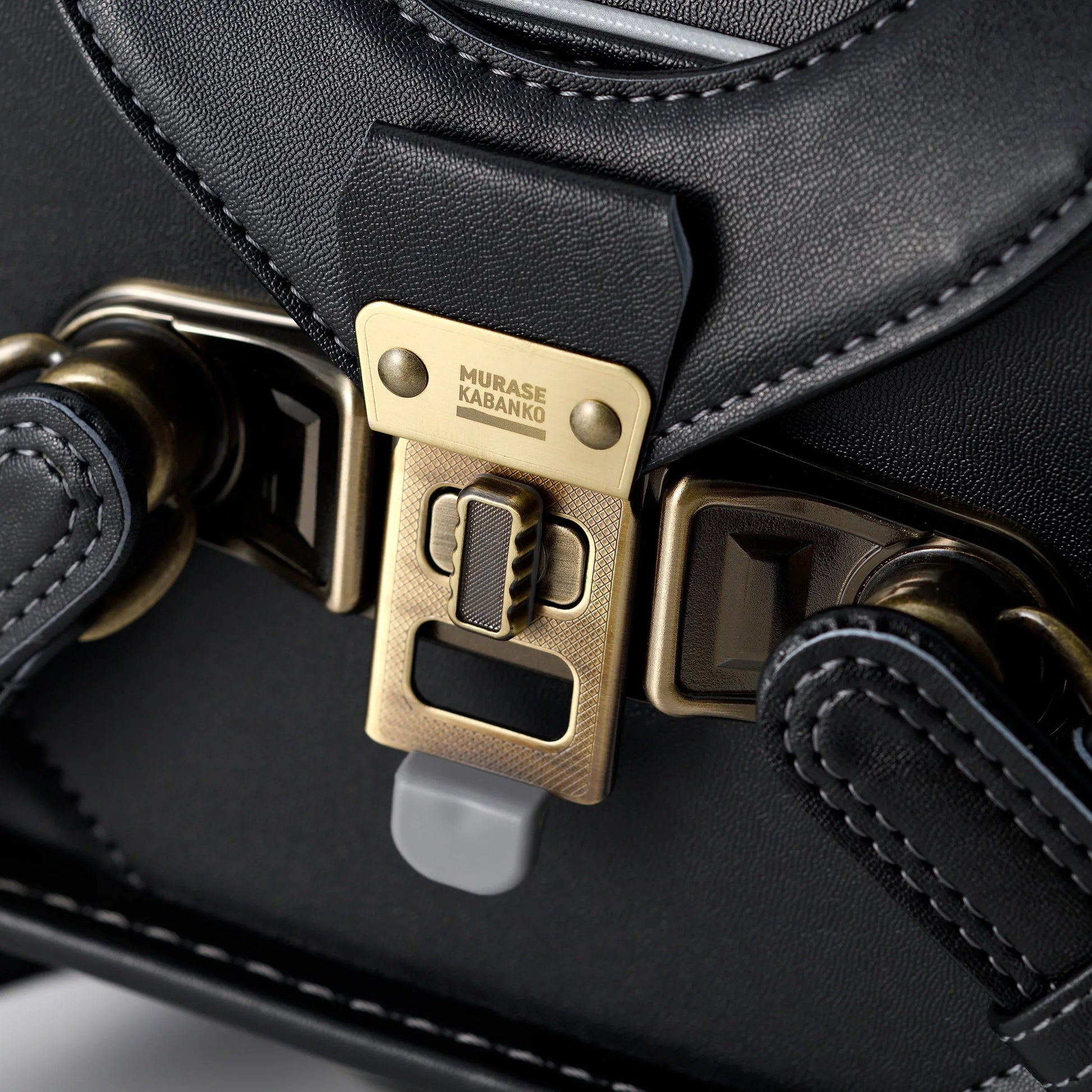 Close-up of Japanese randoseru backpack black leather with Murase Kabanko brass clasp