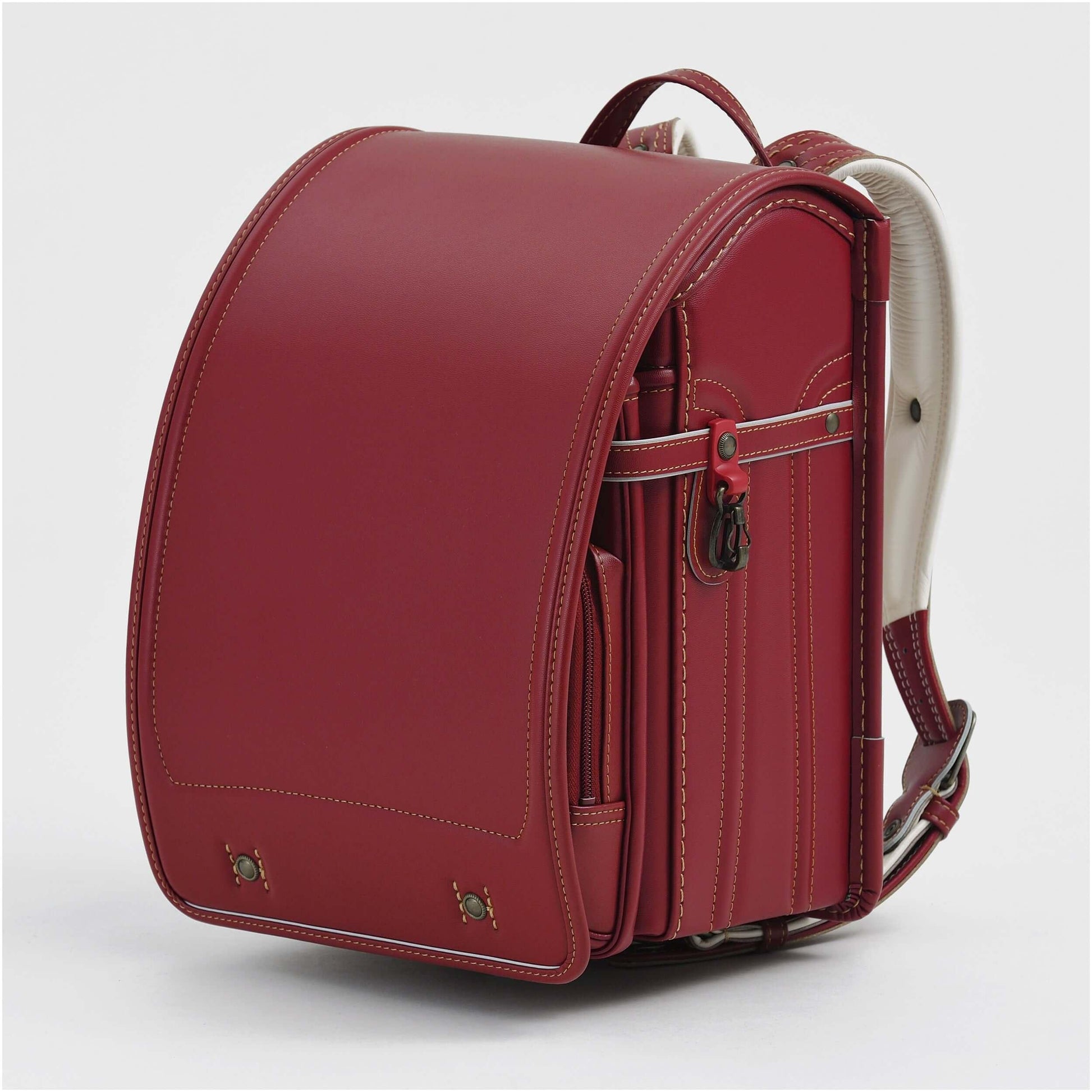 Randoseru Bolca Leather backpack in red by Murase Kabanko (村瀬鞄行)