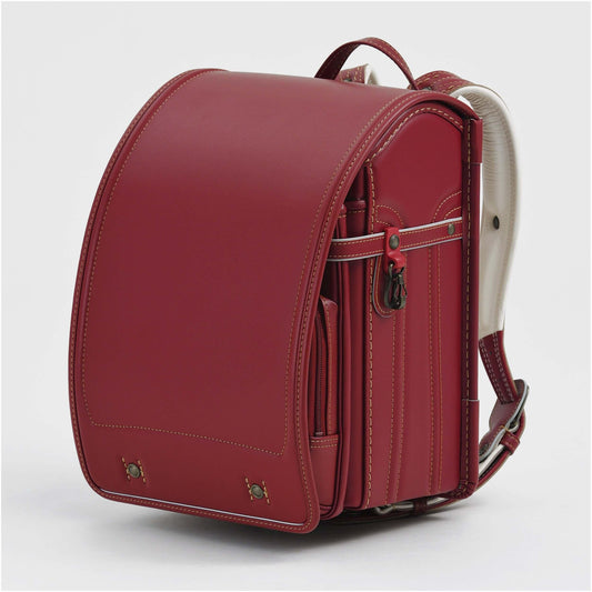 Randoseru Bolca Leather backpack in red by Murase Kabanko (村瀬鞄行)