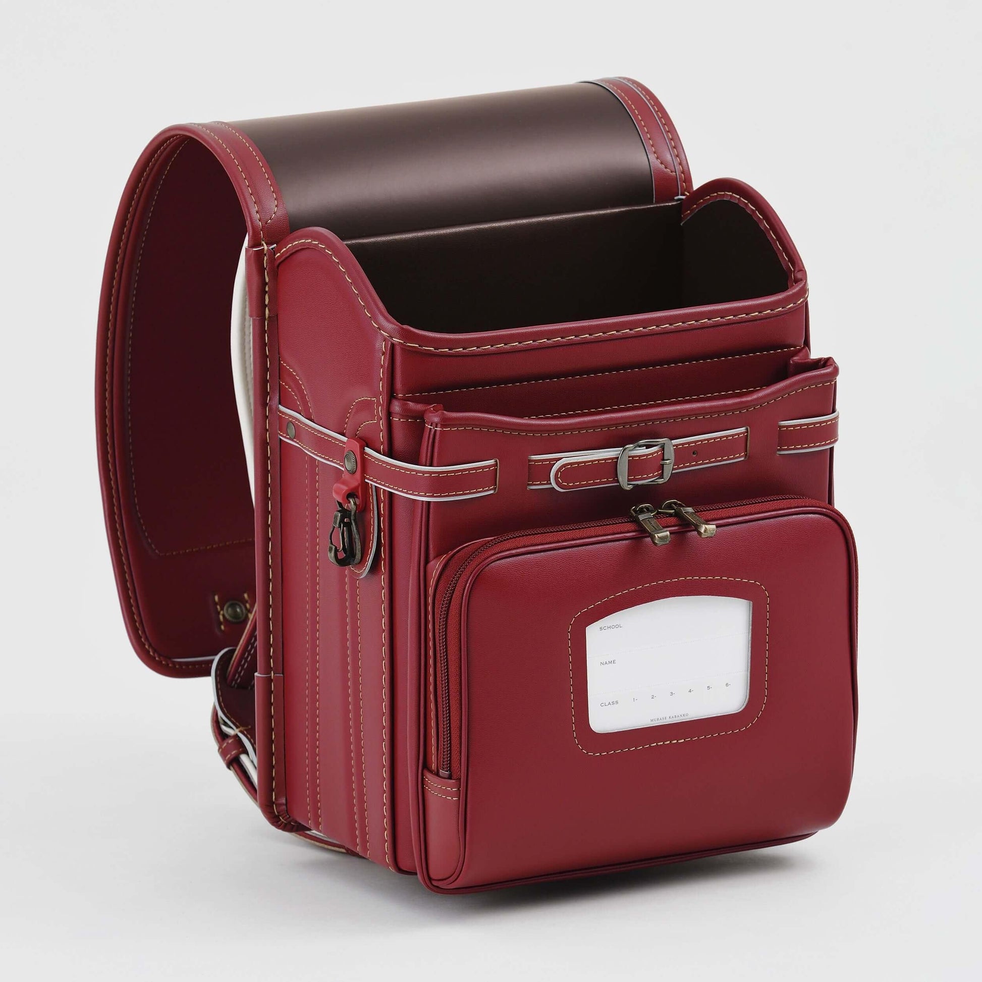 Randoseru Bolca Leather backpack in red with front pocket and ID window