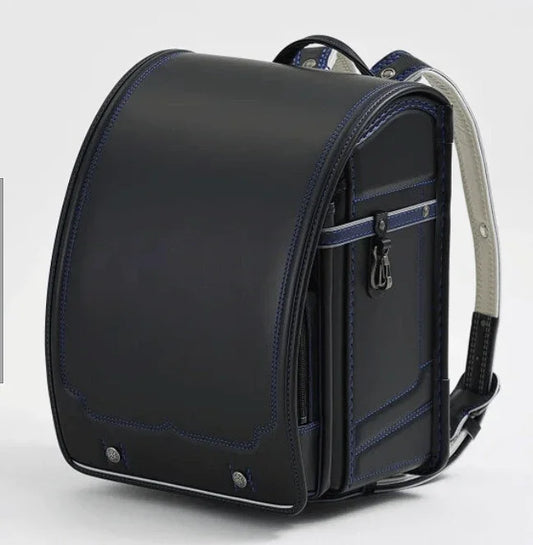 Randoseru backpack, black with blue stitching, traditional Japanese school bag