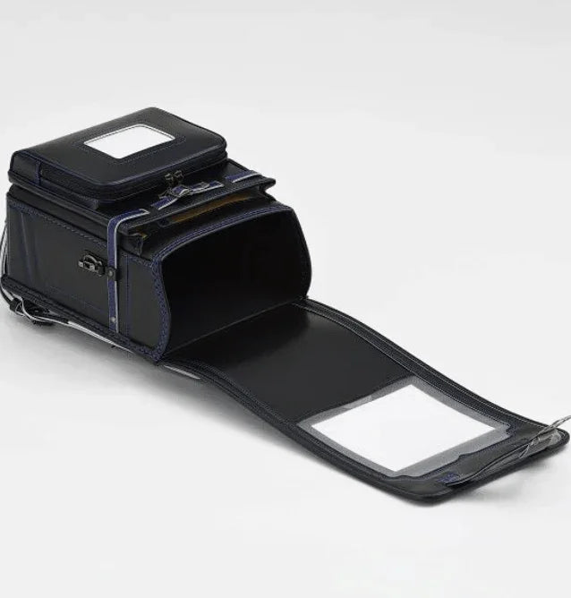 Randoseru black backpack opened to reveal spacious inner compartments