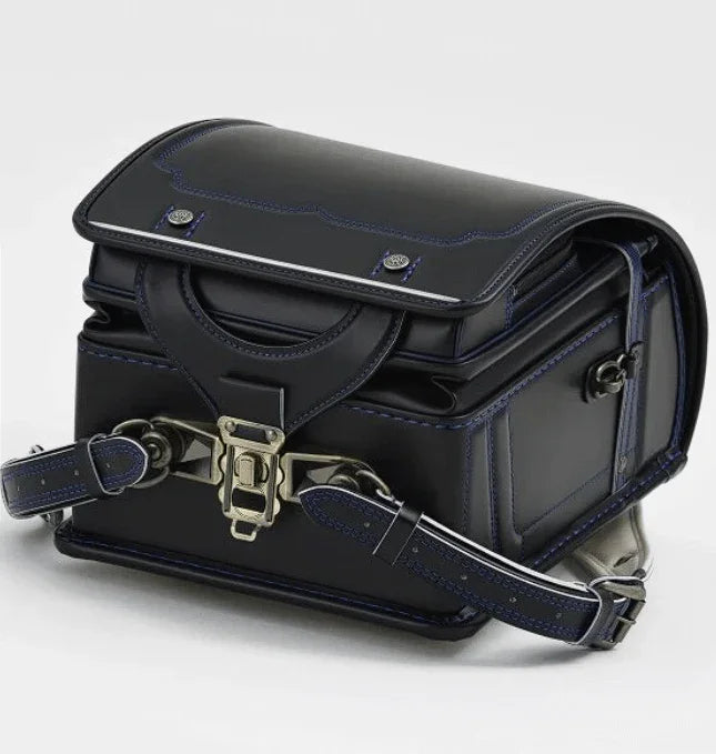 Randoseru backpack, black color with blue stitching and metal clasp by Murase Kabanko (村瀬鞄行)