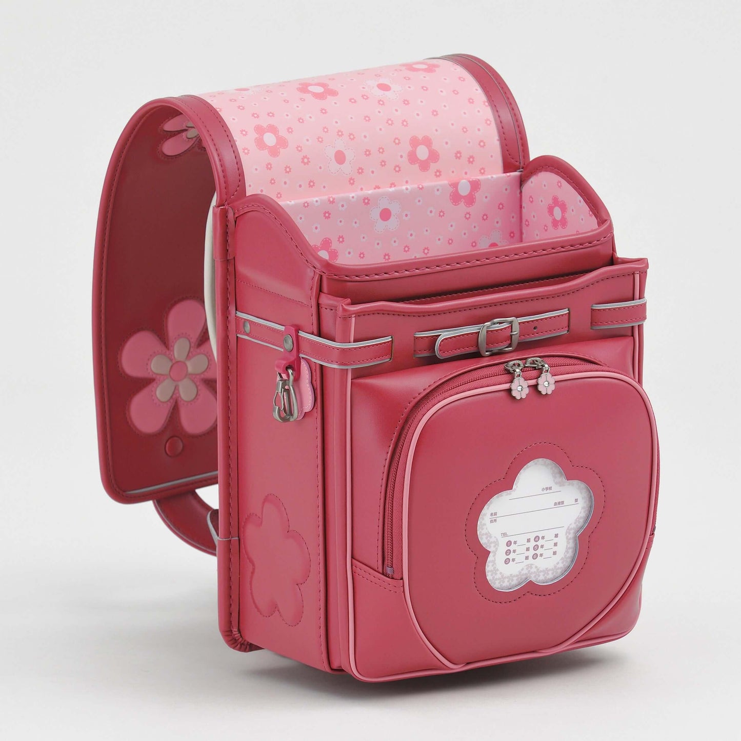Randoseru Rose backpack pink with flower-pattern flap and front pocket by Murase Kabanko
