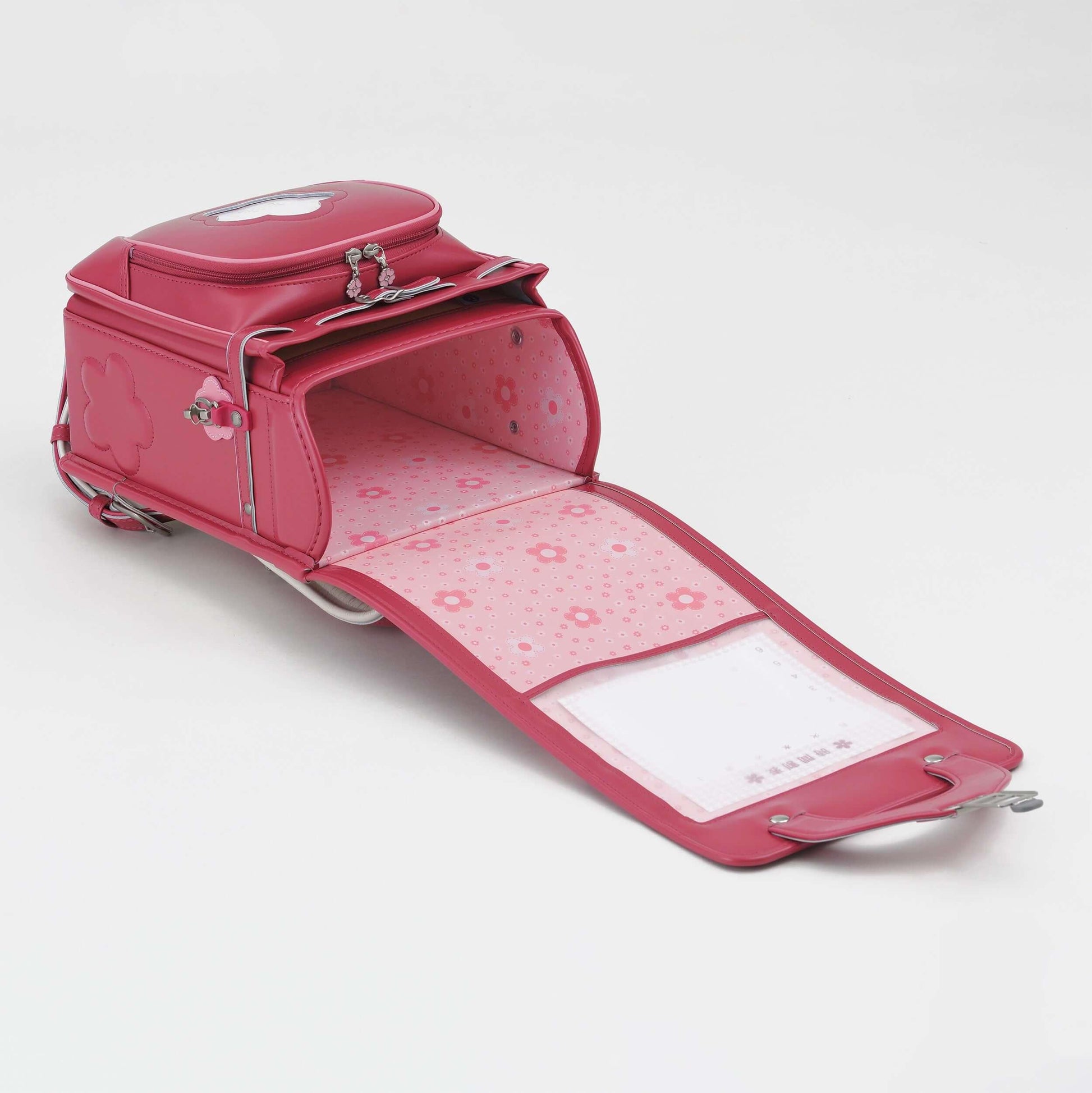 Randoseru Rose pink backpack by Murase Kabanko with floral lining, opened to reveal interior