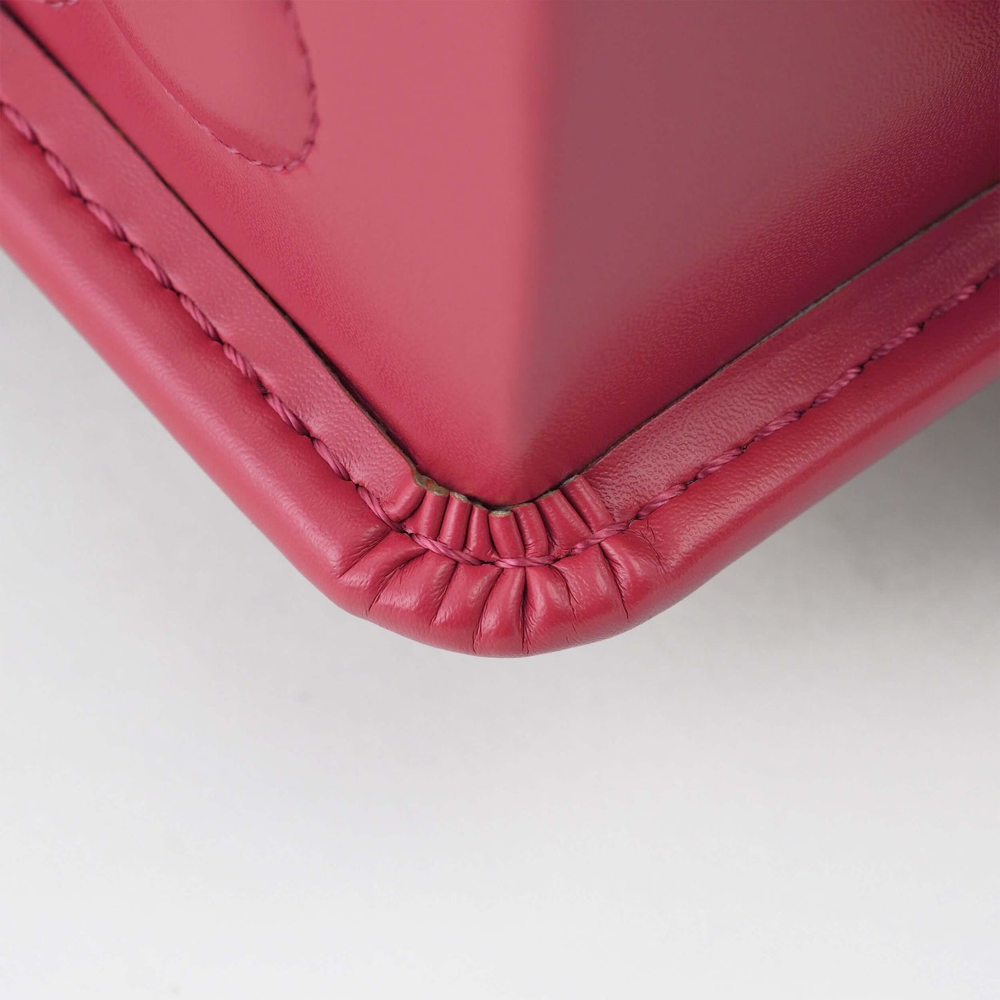 Randoseru backpack in rose pink leather with corner stitching detail